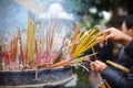 Pilgrims burning incense sticks at the temple, Asia Royalty Free Stock Photo