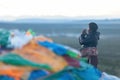 Pilgrims circumambulating Mt. Kailash by performing prostrations, Western Tibet Royalty Free Stock Photo