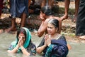 Pilgrims cleansing themselves in Brahmaputra River