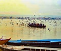 Pilgrims enjoying early sunrise boat ride on Ganga/Ganges river in Varanasi, India Royalty Free Stock Photo