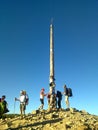 Pilgrims in Foncebadon cross. Camino de Santiago. Spain