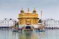 Pilgrims at the Golden Temple, the holiest Sikh gurdwara in the world. Royalty Free Stock Photo