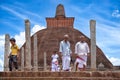 Pilgrims leave the Jetavanaramaya stupa after prayers, Sri Lanka Royalty Free Stock Photo