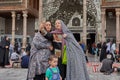 Pilgrims make photos in the mosque courtyard, Tehran, Iran.