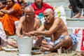 Pilgrims offers prayers to their ancestors