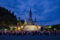 Pilgrims partaking in La Procession Mariale Aux Flambeaux or the Torchlight Marian Procession in Lourdes Royalty Free Stock Photo