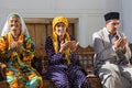 Pilgrims praying in the historical necropolis of Shakhi Zinda in Samarkand, Uzbekistan