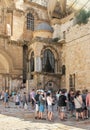 Pilgrims stand in line at the entrance to the Church of the Holy Sepulcher Church of the Resurrection of Christ.