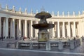 Pilgrims and tourists near the colonnade of St Peter basilica, Vatican City, Royalty Free Stock Photo