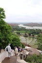 The pilgrims visiting Hanuman Temple at Anjana mountain of Hampi (crossing the river)