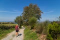 Pilgrims walk along the Camino De Santiago