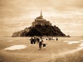 Piligrims walking to Mont Saint Michel Royalty Free Stock Photo