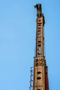 Piling machine isolated on blue background