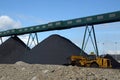 Piling up the coal Royalty Free Stock Photo