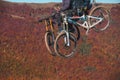 Pilipets, Ukraine - October 10, 2021: bicyclers with mountain bikes on chairlift