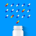 Pill bottle and carefully assorted pills Royalty Free Stock Photo