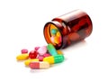 Pill bottle spilling pills Royalty Free Stock Photo