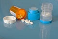 Pill crusher and prescription bottle with pills