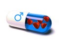 Pill filled with hearts with men symbol Royalty Free Stock Photo