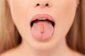 Pill on her tongue. Royalty Free Stock Photo