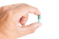 Pill in male hand Royalty Free Stock Photo