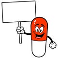 Pill Mascot with Sign Royalty Free Stock Photo