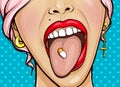 Pill on tongue, woman face with open mouth closeup Royalty Free Stock Photo