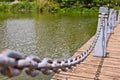 Pillar and chain fence down on a lake side