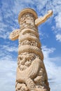 Pillar with dragon figures against a blue sky with dramatic clouds, Beijing, China Royalty Free Stock Photo