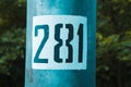 Pillar with number 281. Metal pillar