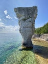 Pillar rock rise from the waters of Georgian Bay on Flowerpot island in Fathom Five National Marine Park