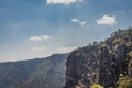 Pillar rocks with blue sky and clouds Royalty Free Stock Photo