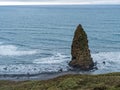 A pillar shaped sea stack off the beach at Cape Blanco State Park, Oregon, USA Royalty Free Stock Photo