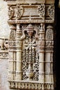 Pillar with stone carving