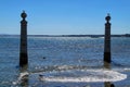 Pillars of Do Comercio square on the Banks of Tagus river in Lisbon Royalty Free Stock Photo