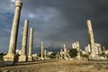 Pillars lowangle in sunlight during storm in ruins with dramatic cloudscape in Tyre, Sour, Lebanon