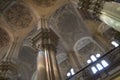 Big pillars, vaults and stained glass windows in Malaga Cathedral, Spain