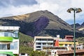 Pillku Urku mountain summit with colorful buildings in the city of Cusco Royalty Free Stock Photo