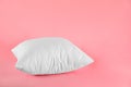 Pillow with clean pillowcase on pink background Royalty Free Stock Photo