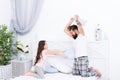 Pillow fight. Dad seeks to live life of integrity and honesty. Sincere emotions. Dad and daughter having fun. Pajamas Royalty Free Stock Photo