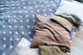 Pillows on a blue blanket. Bedding decor pillows. Blue star blanket