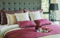 Pillows and decorative tray on the bed Royalty Free Stock Photo