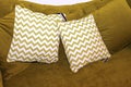 Pillows on green sofa Royalty Free Stock Photo