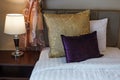 Pillows on white bed sheet bedding and lamp on bed side table. Twin beds room hotel resort apartment lodge inn residential service