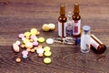 Pills and ampules on wooden background Royalty Free Stock Photo