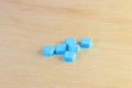 Pills blue On wooden floor with copy space