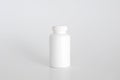 Pills bottle. White medical container for drugs, diet, nutritional supplements. White plastic jar for pills. Packaging