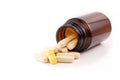 Pills brown bottle one different yellow Royalty Free Stock Photo