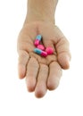 Pills capsule on hand outstretched Royalty Free Stock Photo