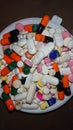 Pills and capsules of different shapes and colors